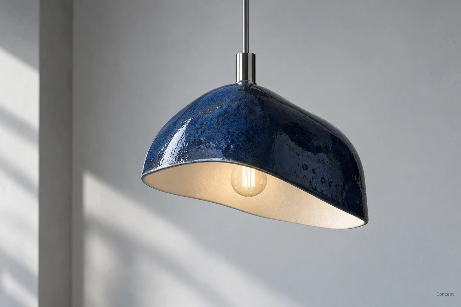 A blue glazed ceramic pendant with a pale interior suspended against a softly lit wall. AI-generated concept study.