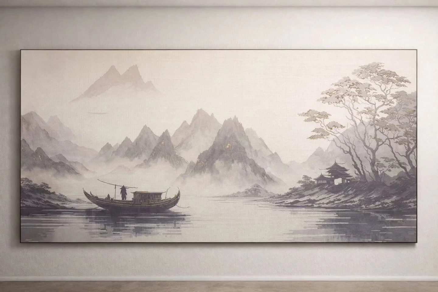 A wide thin-framed canvas hung on a plain wall showing a monochrome ink-wash landscape of misty mountains, a wooden boat on still water and a pagoda beneath a tree.